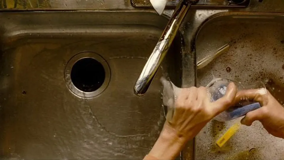 Top-down, washing up at the sink