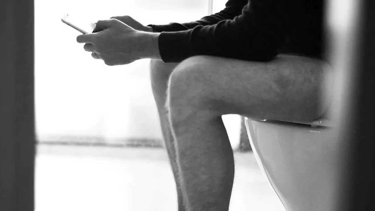 Sitting on the toilet, scrolling